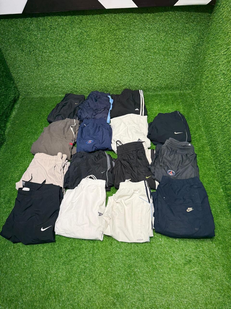 mixed branded track pants